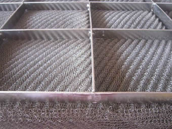 A corner of stainless steel mist eliminator with stainless steel girds.